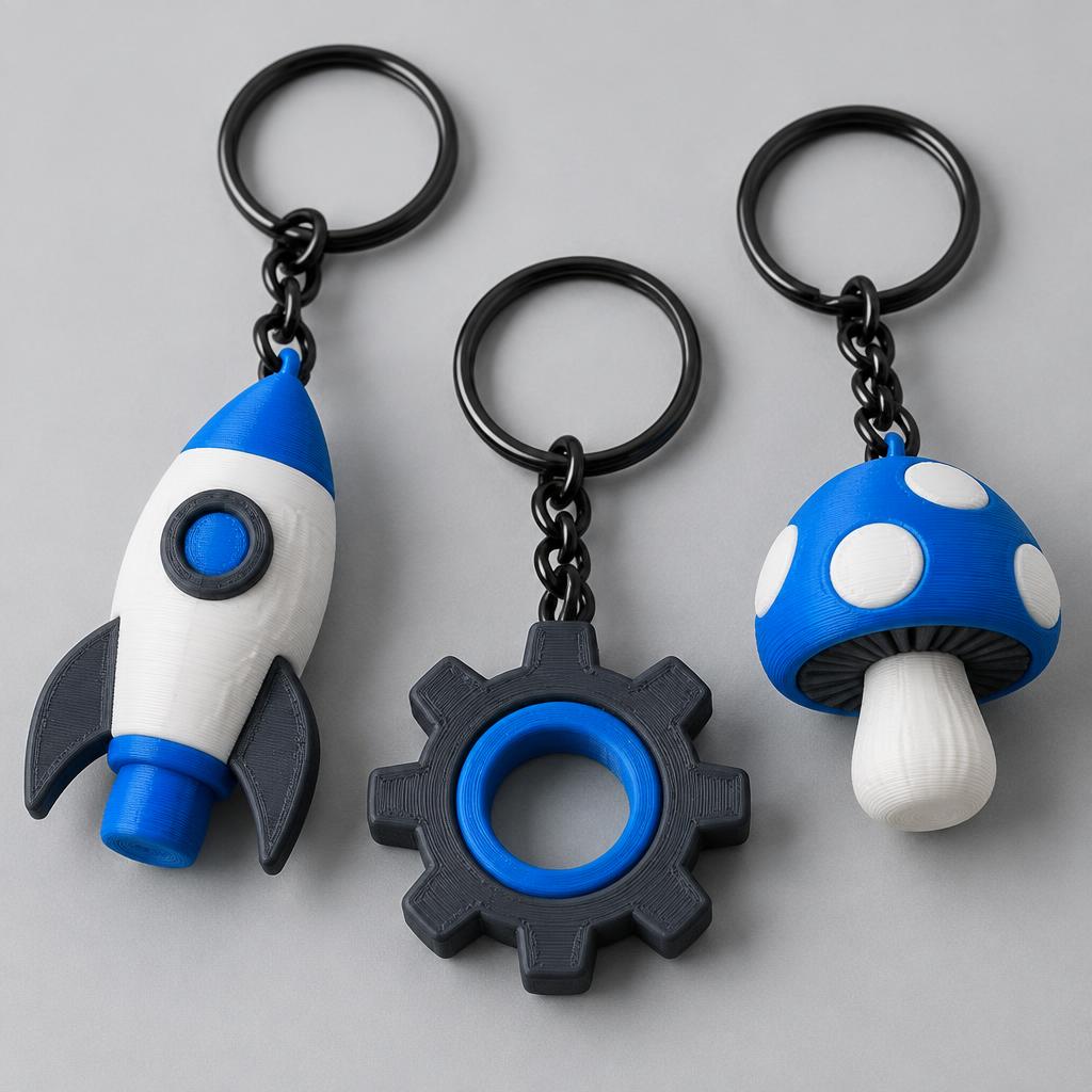 Blue, white and graphite 3D-printed keychains